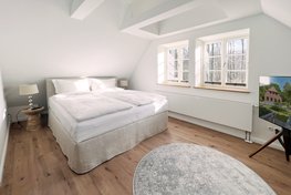 Ostsee-Suite Hohwacht Schlafzimmer mit Doppelbett